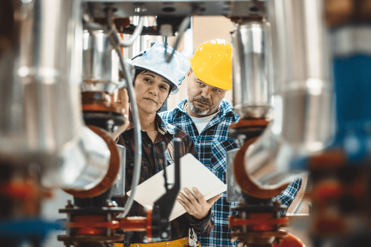 woman, man, inspecting boiler equipment